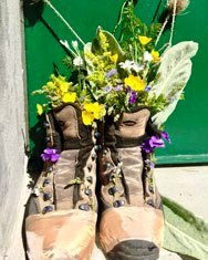 Parting with loved walking boots in the Abruzzo Mountains Italy