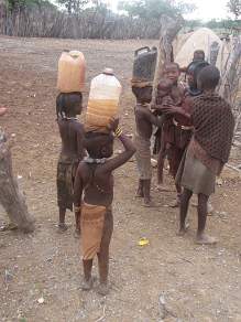 Himba children collecting water
