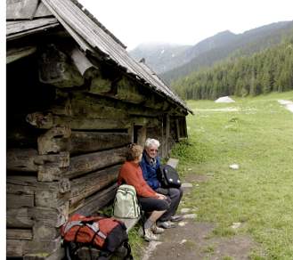 Walkers resting besides a sherperds hut near Zakopane
