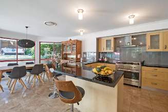 Modern and spacious kitchen with dining area